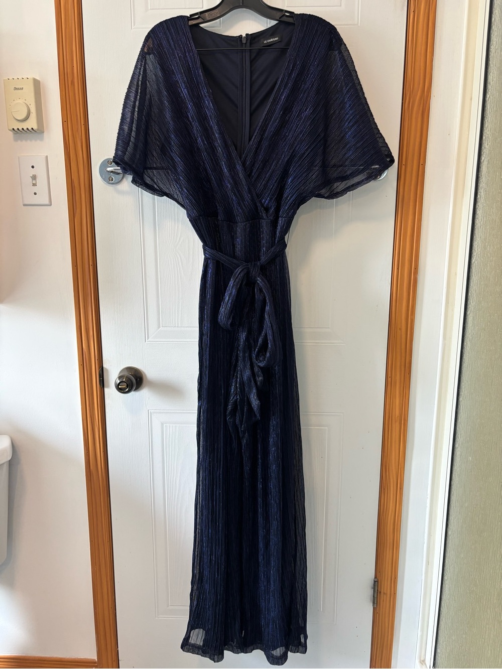 le chateau Navy Blue Sheer Wrap Jumpsuit with Belt